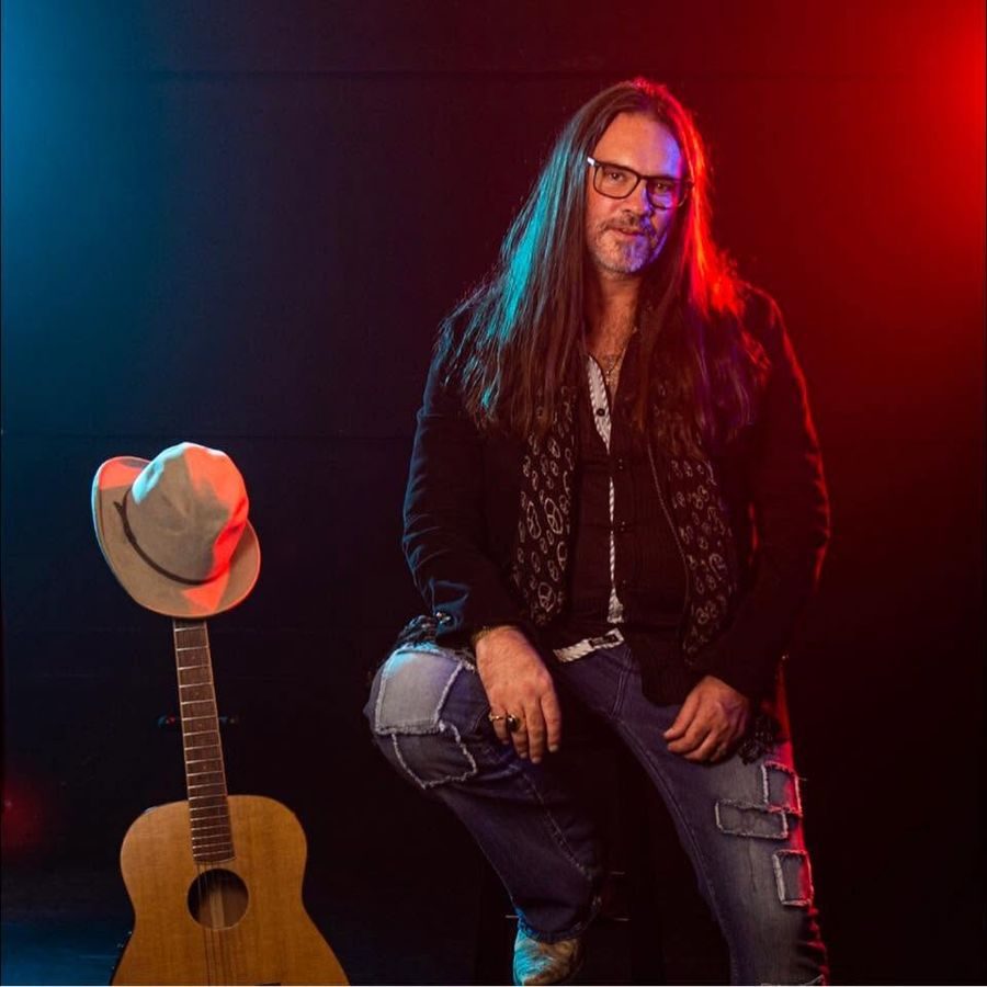 Bo Bice on stage under the lights